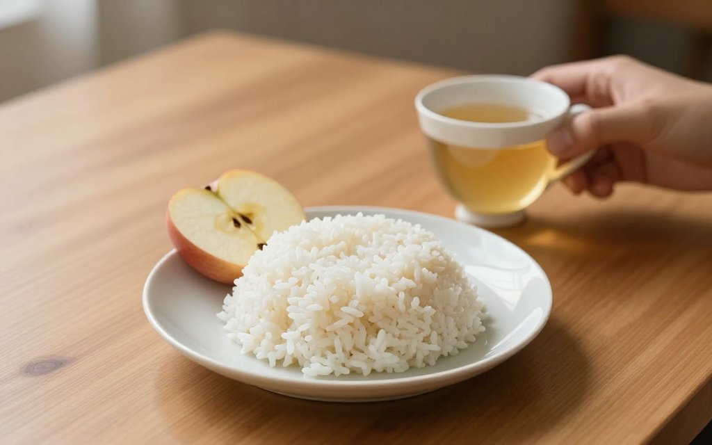 Small bland meal with ginger tea and apple slices, the kind of food experts suggest for Ozempic nausea